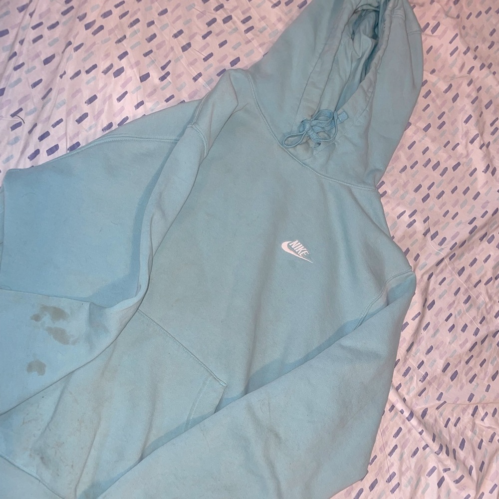 Blue Nike hoodie. Washed it 2 times and stain on sleeve will not come out!